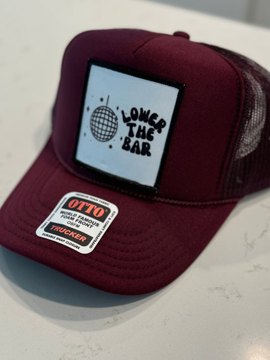 Lower The Bar Trucker Hat