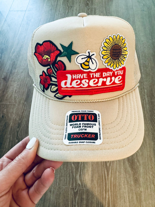 Have The Day You Deserve Trucker Hat